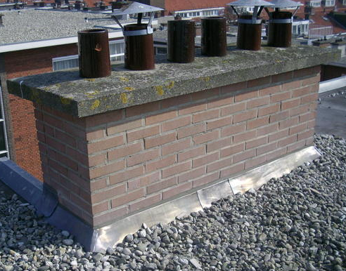 Loodwerk bij muuraansluiting en dakrand platdak